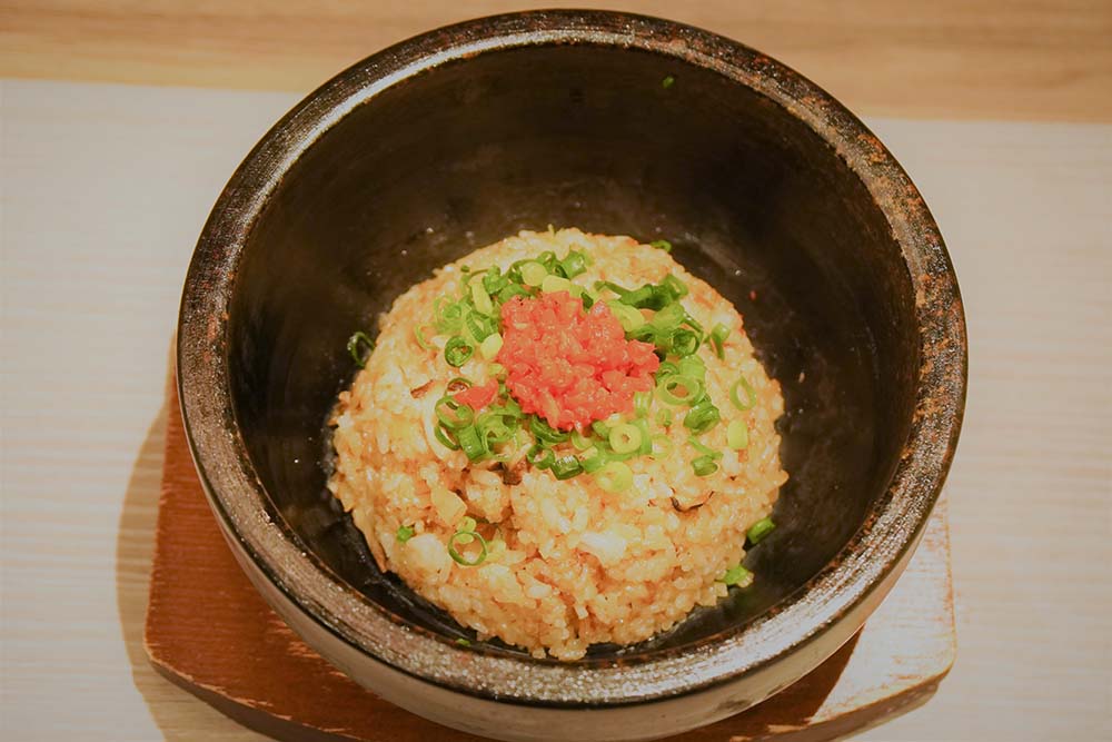 Fried rice with cow tripe cooked in a stone pot